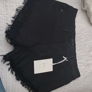 Jean shorts in black. NWT